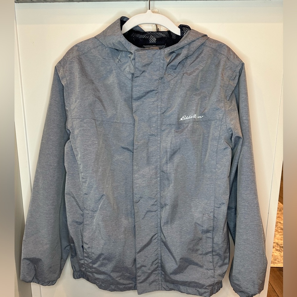 Eddie Bauer Light weight hooded rain jacket with mesh lining. Size Small (7-8).